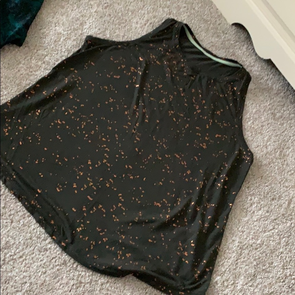 Green tank with gold flecks